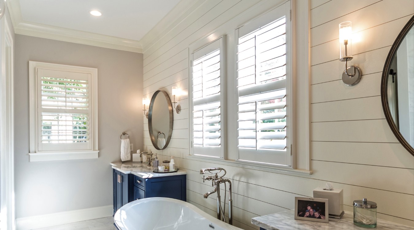 San Diego bathroom with white plantation shutters.