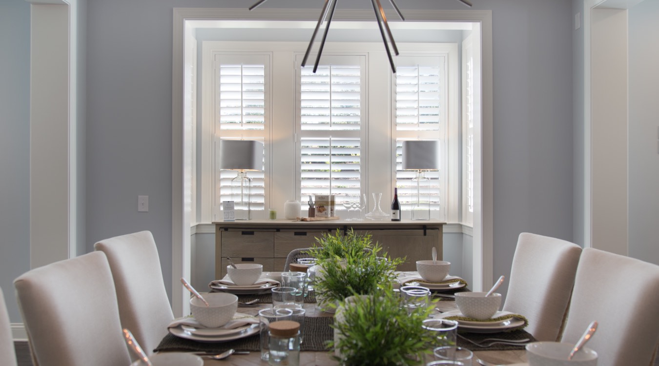 Sunburst shutters in a dining room