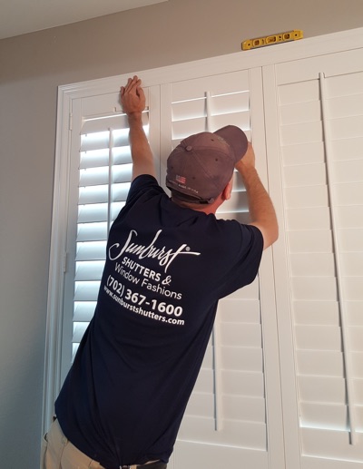 Shutter installation in San Diego bedroom.