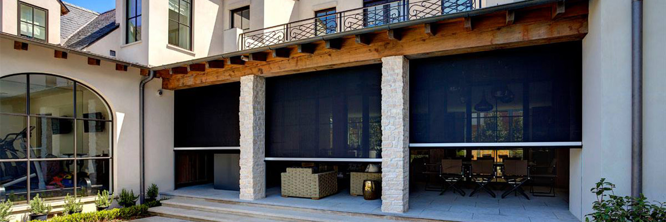 Black pull-down retractable screen doors on three home patio openings facing a blue pool