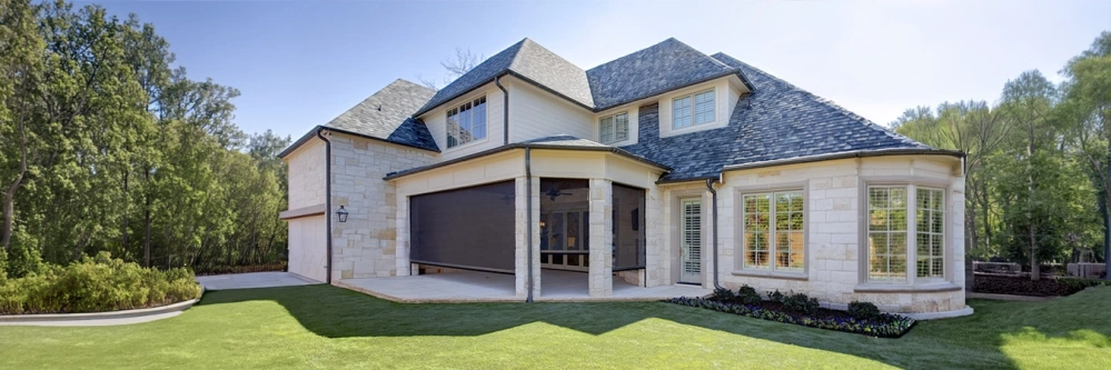 Retractable screens on all sides of a covered patio