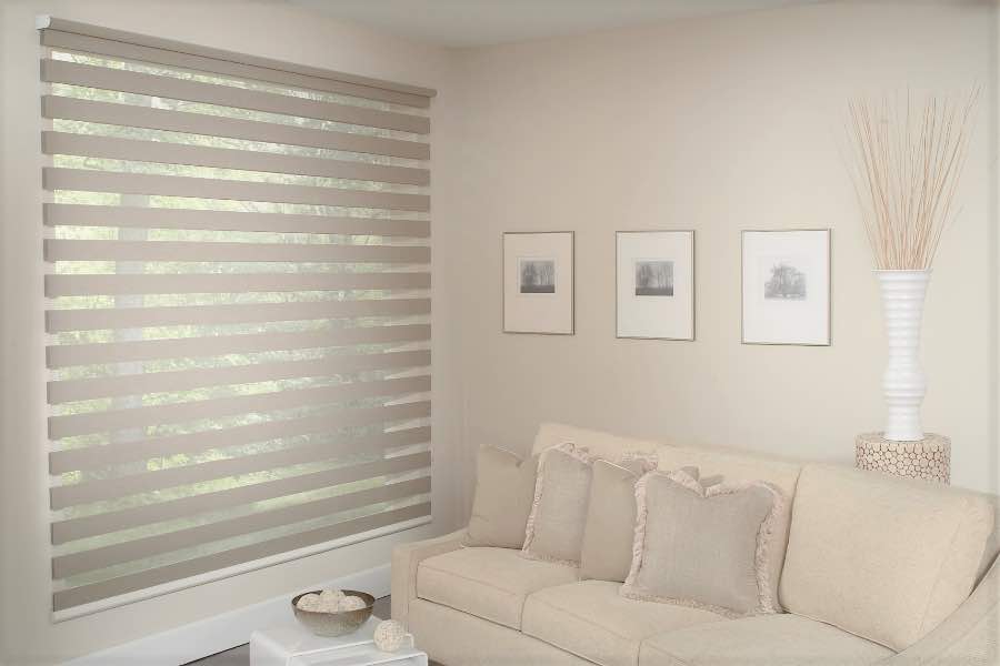Zebra shades give you a unique combination of light control and style that benefits your San Diego home. Zebra shade allows filtered light into a living room