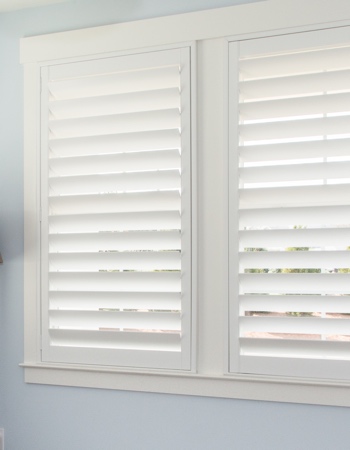 Hidden tilt rod shutters closed. Plantation shutters with hidden tilt rods in San Diego