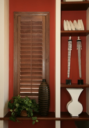You can even coordinate your wood shutters with shelving. San Diego wood shutter shelving
