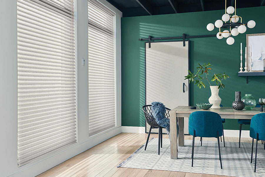 Versatile sheer shades let you decide how much of a view you want while enjoying your San Diego dining room. White sheer shades on windows in a green dining room